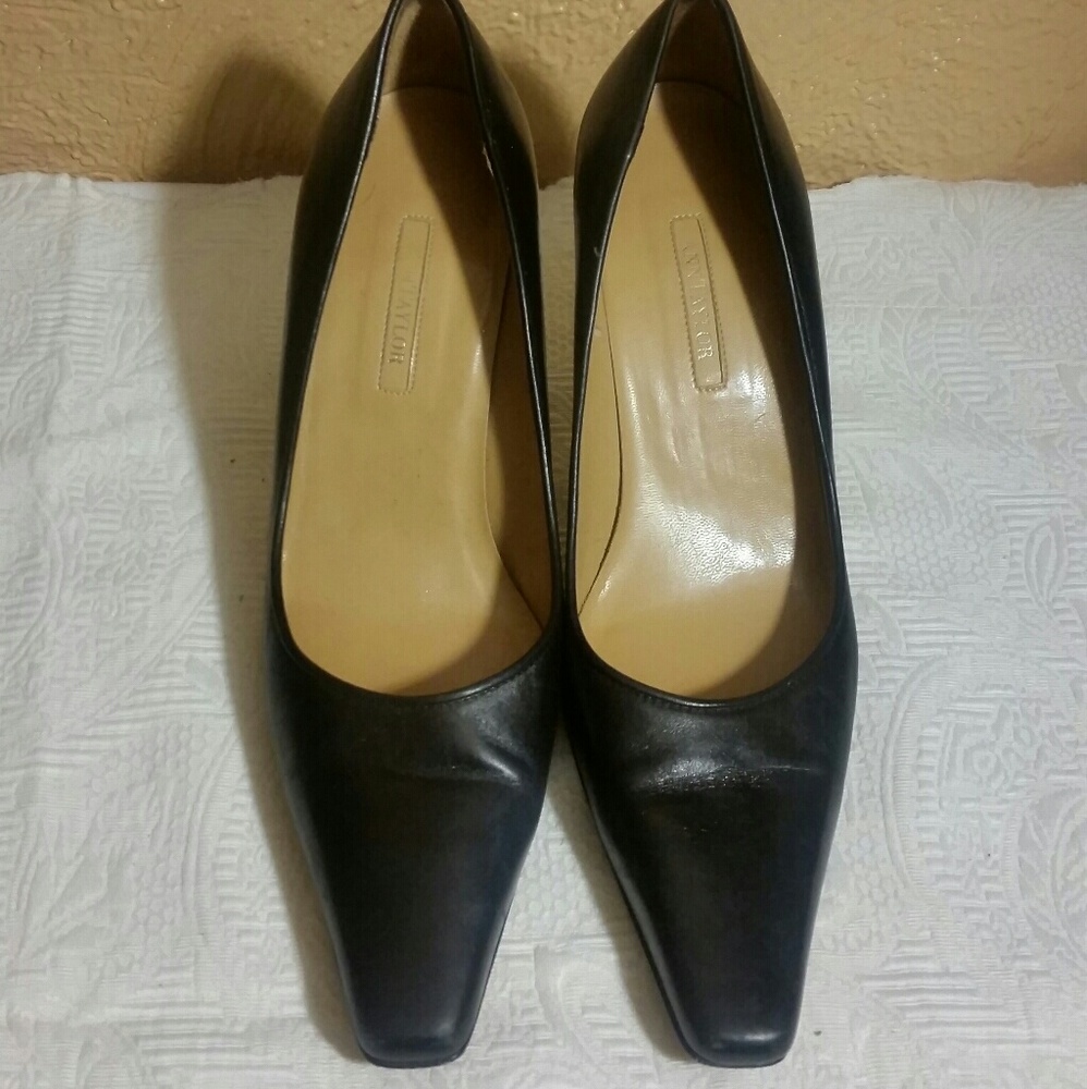 Black leather pumps